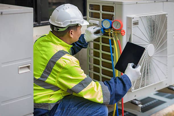 Professional Air Conditioning Repair technician working in Oswego, NY